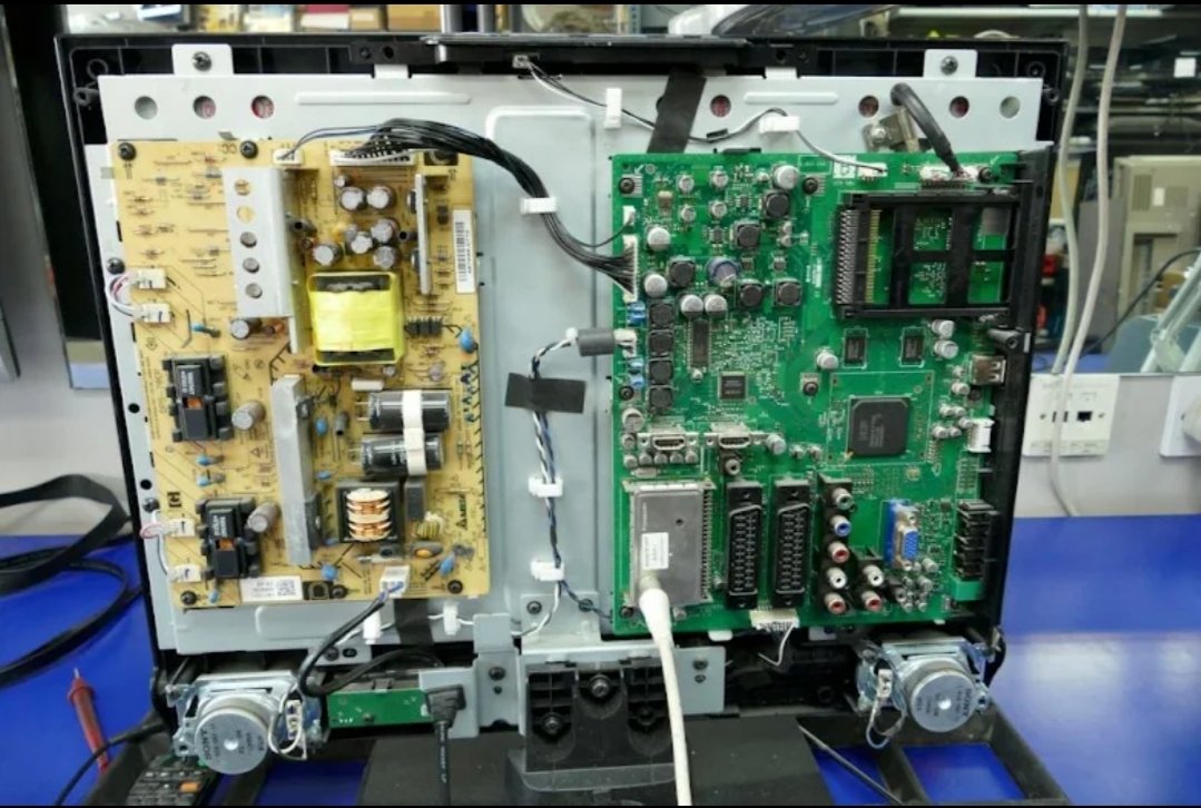 LCD TV repair showing power supply and main board servicing