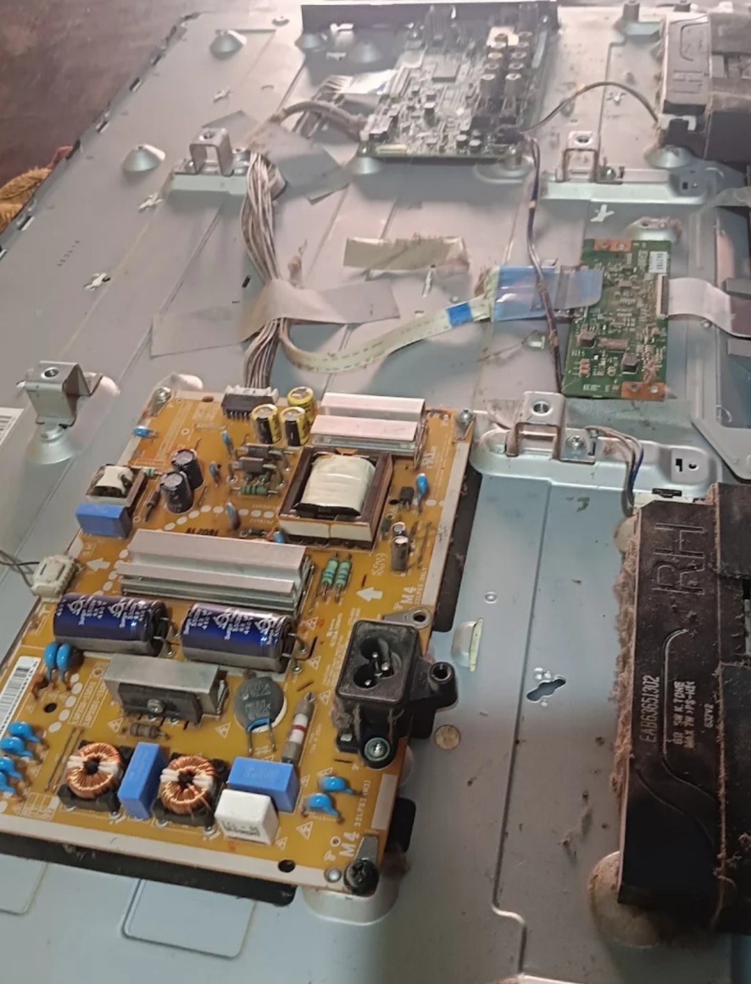 LED TV power supply board removed for capacitor level repair