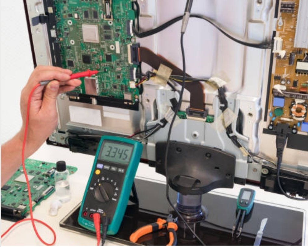 Voltage testing of TV circuit boards with digital multimeter